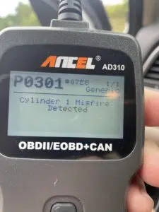 Car obd2 scanner showing engine misfire on cylinder one.